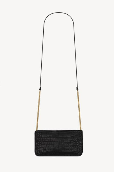 SAINT LAURENT CASSANDRE PHONE HOLDER IN SHINY CROCODILE-EMBOSSED LEATHER BLACK