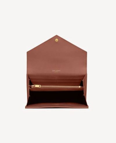 SAINT LAURENT CASSANDRE MATELASSÉ LARGE FLAP WALLET IN GRAIN DE POUDRE LEATHER